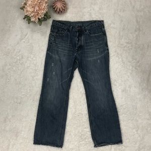 Yves Saint Laurent Button Fly Jeans
